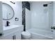 Charming bathroom featuring decorative backsplash, modern fixtures, and a shower-tub combination for a sleek design at 315 Confederate St, Fort Mill, SC 29715