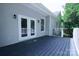 Outdoor deck features gray siding, a dark wood stained surface and white railings at 315 Confederate St, Fort Mill, SC 29715