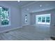 Open living space boasting hardwood floors, recessed lighting, and a large picture window at 315 Confederate St, Fort Mill, SC 29715