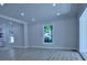 Bright open living room showcasing wood floors, neutral paint, recessed lighting, and natural light at 315 Confederate St, Fort Mill, SC 29715