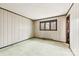 Bedroom featuring a window, a door and light green carpet flooring throughout at 32 Bowen Dr, Belmont, NC 28012