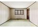 Bedroom featuring a window, a door and light green carpet flooring throughout at 32 Bowen Dr, Belmont, NC 28012