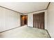 Bedroom with a closet, a door and light green carpet flooring throughout at 32 Bowen Dr, Belmont, NC 28012