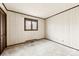 Bright bedroom featuring wood paneled walls, carpet and a window with natural light at 32 Bowen Dr, Belmont, NC 28012