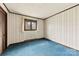 Bedroom with a window, a closet, and blue carpet flooring throughout at 32 Bowen Dr, Belmont, NC 28012