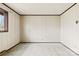 Bedroom featuring a window, electrical outlets, and light green carpet flooring at 32 Bowen Dr, Belmont, NC 28012
