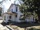 Two-story home featuring a covered front porch at 322 E Houston St, Monroe, NC 28112