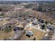 Aerial view of the residential neighborhood and its proximity to utility infrastructure at 403 Easy St, Concord, NC 28027