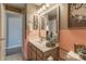 Bathroom featuring a vanity, sink, mirror, and updated lighting at 403 Easy St, Concord, NC 28027