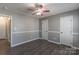 Bedroom with natural light, wood-look floors, and neutral color scheme at 403 Easy St, Concord, NC 28027