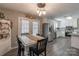 Eat-in kitchen with stainless steel appliances and views to the dining room at 403 Easy St, Concord, NC 28027