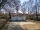Spacious detached two-car garage with ample parking and a fenced backyard at 403 Easy St, Concord, NC 28027