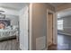 Hallway that connects to other rooms, featuring a neutral color scheme and wood-look flooring at 403 Easy St, Concord, NC 28027