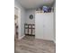 Functional laundry room with white cabinets and washer, dryer combo at 403 Easy St, Concord, NC 28027