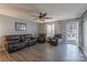 Inviting living room with hardwood floors, comfortable seating, and large windows providing ample natural light at 403 Easy St, Concord, NC 28027