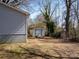 View of a shed located in the spacious backyard of the property at 403 Easy St, Concord, NC 28027