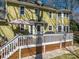 Backyard deck with dining and lounge seating, offering a great space for relaxation and entertaining at 4301 Old Forge Dr, Gastonia, NC 28056