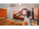 Cozy bonus room featuring comfortable seating, a treadmill, and a bright window at 4301 Old Forge Dr, Gastonia, NC 28056