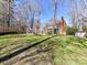 Expansive backyard featuring a well-manicured lawn and privacy fence, perfect for outdoor enjoyment at 4522 Pendock Ct, Charlotte, NC 28226