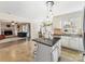 Bright kitchen with granite countertops, stainless steel appliances and a kitchen island at 4522 Pendock Ct, Charlotte, NC 28226