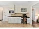 An ideal home office featuring custom cabinets, built in desk and granite countertops at 4522 Pendock Ct, Charlotte, NC 28226