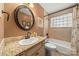 Bathroom with a vanity, toilet, and tub at 4531 Montibello Dr, Charlotte, NC 28226