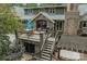 Back of home featuring large deck, outdoor seating, and brick exterior at 4531 Montibello Dr, Charlotte, NC 28226