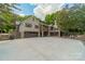 Beautiful brick home with a spacious driveway and three car garage at 4531 Montibello Dr, Charlotte, NC 28226