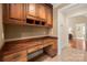 Home office with custom wood built-ins and spacious desk area at 4531 Montibello Dr, Charlotte, NC 28226