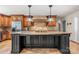 Spacious kitchen island with granite countertop and stylish pendant lighting at 4531 Montibello Dr, Charlotte, NC 28226