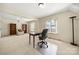 Spacious office featuring a desk and large windows for lots of light at 4531 Montibello Dr, Charlotte, NC 28226