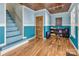 Spacious basement featuring stair access, wood-look flooring, and closet storage at 547 Lake Shore Dr, Norwood, NC 28128
