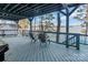 Spacious deck overlooking the water, with comfortable seating for enjoying the view at 547 Lake Shore Dr, Norwood, NC 28128