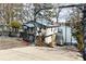 Stunning home with a blue metal roof near lake, offering beautiful lake views and convenient waterfront access at 547 Lake Shore Dr, Norwood, NC 28128