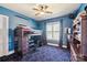 bedroom with bed, storage, window, and colorful carpet at 5628 Creole Rd, Clover, SC 29710