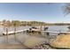 Picturesque dock featuring boat and jet ski lifts, providing easy access for lake activities and enjoyment at 5628 Creole Rd, Clover, SC 29710