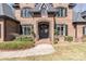 Close up of entry door showcasing brick facade, meticulous landscaping and address numbers at 5628 Creole Rd, Clover, SC 29710