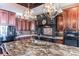 A kitchen has a marble top island with seating and stainless steel appliances at 5628 Creole Rd, Clover, SC 29710