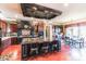 A spacious kitchen showcases a large island, modern light fixtures, and dark wood cabinets at 5628 Creole Rd, Clover, SC 29710