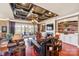 The living room boasts a coffered ceiling, lake views, and refined decor at 5628 Creole Rd, Clover, SC 29710