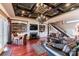 A stylish living room features a coffered ceiling, custom built-ins, and a cozy fireplace at 5628 Creole Rd, Clover, SC 29710