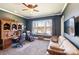 Well appointed office with lake view, desk, sofa, and massage chair at 5628 Creole Rd, Clover, SC 29710
