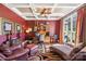 This home office features coffered ceilings, hardwood floors, large window, and decor at 5628 Creole Rd, Clover, SC 29710