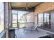 Relax on this screened porch with ceiling fan, outdoor TV, and lakeside view, perfect for enjoying the outdoors at 5628 Creole Rd, Clover, SC 29710