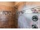 Nicely tiled shower stall with bronze hardware and decorative tile inlay at 5628 Creole Rd, Clover, SC 29710