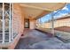 View of the brick carport and fenced backyard of this charming home at 602 Charles Rd, Shelby, NC 28152