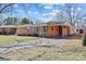 Traditional brick home boasting a covered carport and established landscaping at 602 Charles Rd, Shelby, NC 28152