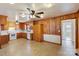 The kitchen features wood paneling, tile floors, and white appliances at 602 Charles Rd, Shelby, NC 28152