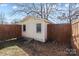 Backyard storage shed in a fenced yard at 602 Charles Rd, Shelby, NC 28152