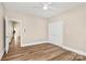 Bedroom with view to rooms down the hall is neutral and ready for decor at 609 Rosemore Pl, Rock Hill, SC 29732